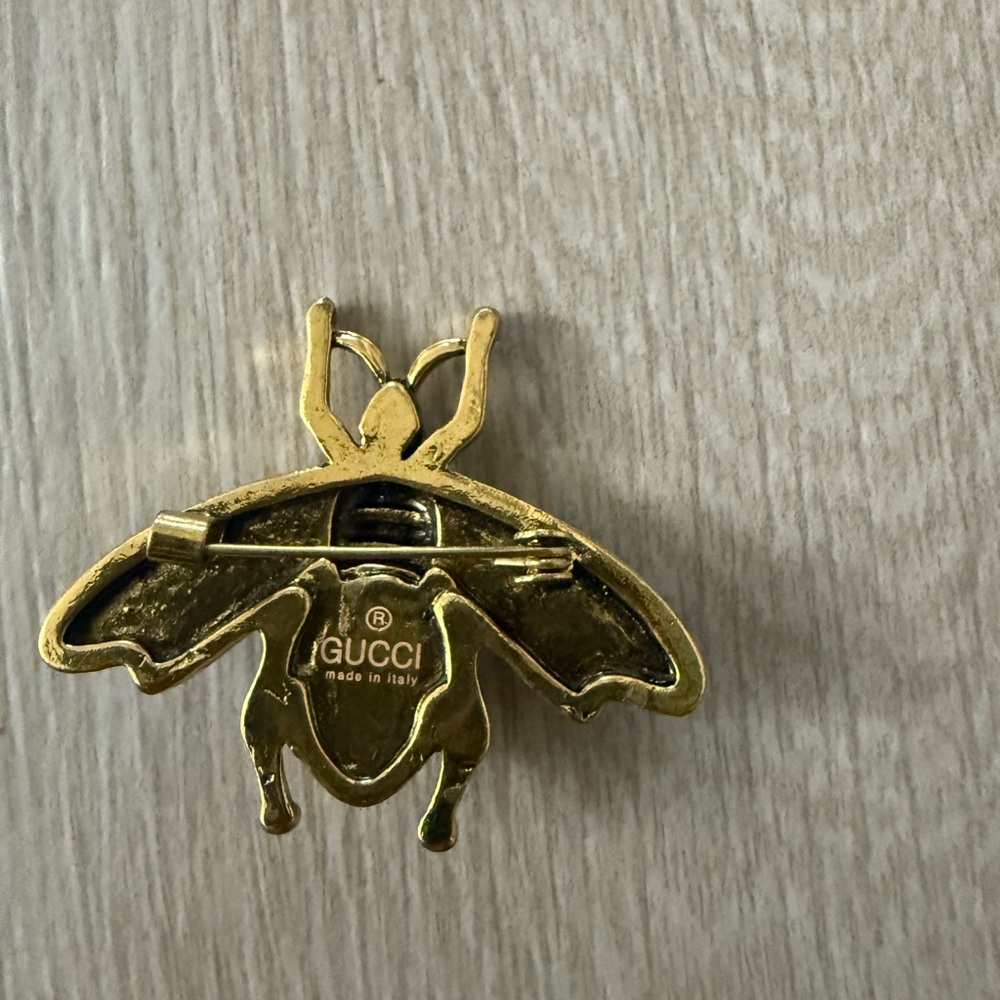 Brand new with box and dusting Gucci Gold and White Bee Brooch Aprox 1.5h by 2”w - Picture 2 of 2